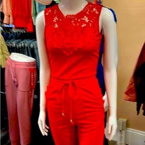 Red women jump suit .